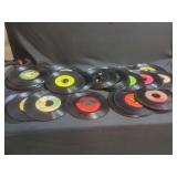 Assorted Vinyl 45 RPM Records with Crates and Sleeves