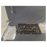 Jewelry Tray Containing Various Rings and Bagged Necklaces