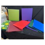 Assorted Ring Binders in Various Colors and Patterns