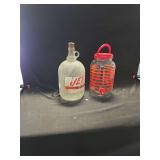 Two Glass Beverage Containers Including Jet Root Beer Jug