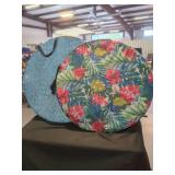 Two Circular Fabric Carrying Bags with Tropical and Geometric Patterns