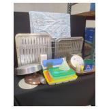 Kitchenware Assortment Including Metal Trays, Plastic Storage Containers, and Glassware
