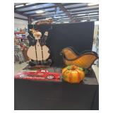 Seasonal Holiday Decor Set Comprising Wooden Snowman Figure, Metal Sleigh, Pumpkin Sculpture, and Red Truck Metal Sign