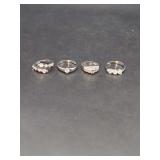 Group of Four Silver-Tone Rings with Faceted Gemstones