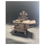 Cast Iron Crescent Toy Cookstove With Miniature Utensils
