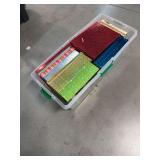 Plastic Storage Tote Containing Gift Boxes and Sewing Book