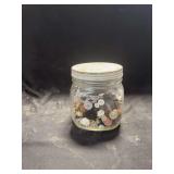 Glass Jar Containing Assorted Sewing Buttons