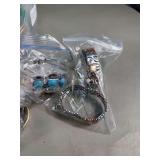 Plastic Bin of Packaged Fashion Bracelets
