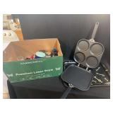Kitchenware Assortment Featuring Double-Sided Pans, Serving Tray, and Glass Jars