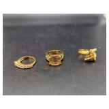 Three Gold-Plated Rings Including Emerald-Cut Stone and Double Horse Motif