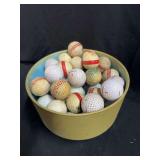 Assorted Golf Balls in Ceramic Bowl