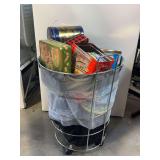 Assorted Decorative Metal Tins in Rolling Laundry Hamper