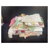 Textile Bundle Featuring Linens, Crochet Pieces, and Fabric Scraps