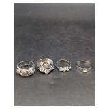 Four Piece Silvertone Ring Set with Faceted Stones
