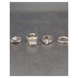 Four Piece Assorted Silver Tone Ring Set with CZ Stones