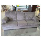 Gray Textured Fabric Three Cushion Sofa with Rolled Arms