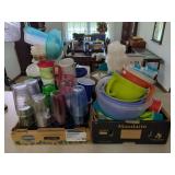 Kitchenware Assortment Including Storage Containers and Measuring Pitchers