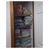 Assorted Home Textiles and Linens in Closet Storage