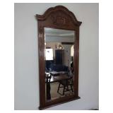 Wood Framed Wall Mirror with Carved Crest and Fluted Accents