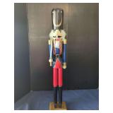 Wooden Soldier Nutcracker Figurine with Sword and Black Tall Hat