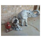 Three Concrete Animal Lawn Sculptures including Elephant, Duck, and Cardinal