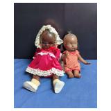 Two Composition Dolls With Fabric Clothing