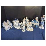 Porcelain Figurine Group in Blue and White with Gilt Accents