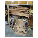 Workshop Material Inventory Including Wood Planks and Abrasives