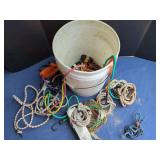 Assorted Bungee Cords and Ratchet Straps in Bucket