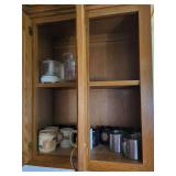 Kitchenware Assortment Including Mugs, Measuring Cups, and Food Processor