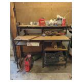 Shop Bench Contents Assortment Including Tools, Chemicals, and Hardware