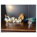 Assorted Collectibles Including Ceramic Duck Figurines, Glassware, and Squirrel Birdhouse