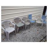 Assorted Outdoor Seating Lot Including Molded Plastic Chairs and Folding Lawn Chairs