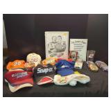 NASCAR Racing Memorabilia Assortment Including Caps, Diecast Cars, and Signage
