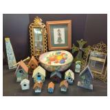 Assorted Home Decor Collection Featuring Birdhouses, Framed Art, and Metal Accents