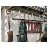 Outdoor Property Maintenance Lot with Ladders and Garden Tools