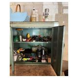 Green Metal Storage Cabinet with Interior Contents