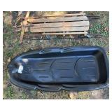 2 Sleds Including Plastic Toboggan and Wooden Runner Sled