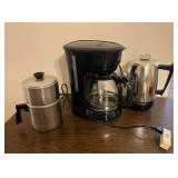 Assorted Coffee Makers Including Electric Drip, Percolator, and Drip Pot