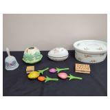 Assorted Kitchenware and Decor Group Including BIA Cordon Bleu Casserole Dish, Avon Porcelain Egg Trinket Box, Ceramic Measuring Spoons, and Stamps