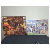 Set of Two Assembled Jigsaw Puzzles Featuring Fishing and Motorcycle Scenes