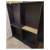 Two Black Modular Shelving Units