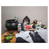 Assorted Halloween Decor Lot Including LED Projector Lights, Skull Totems, and Spooky Signage
