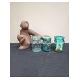 Group of Three Blue Glass Mason Jars and Ceramic Monkey Figurine