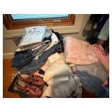 Womens Clothing on Floor Under Window