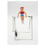 Mechanical Acrobat Toy on Metal Frame