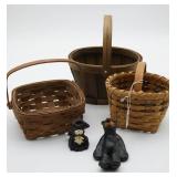 Three Woven Baskets and Two Figurines