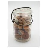 Glass Jar With Assorted Thread Spools