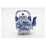 Blue and White Ceramic Teapot with Floral Design