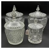 Four Glass Lidded Cookie Jars